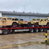 military vehicles transport poland europe nato.jpg